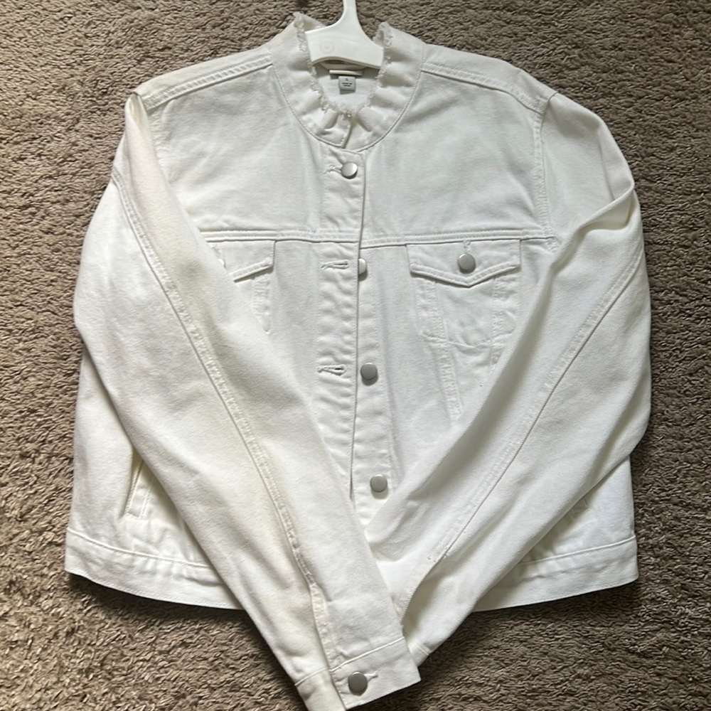White denim jacket in size large. NWOT